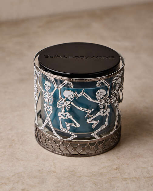 Glow-in-the-Dark Dancing Skeleton 3-Wick Candle Holder