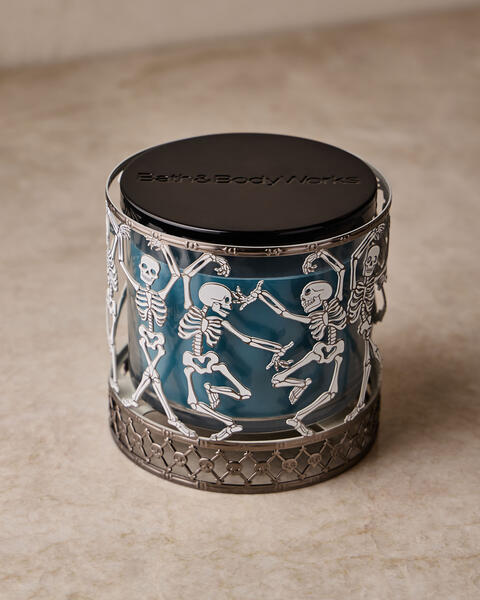 Glow-in-the-Dark Dancing Skeleton 3-Wick Candle Holder