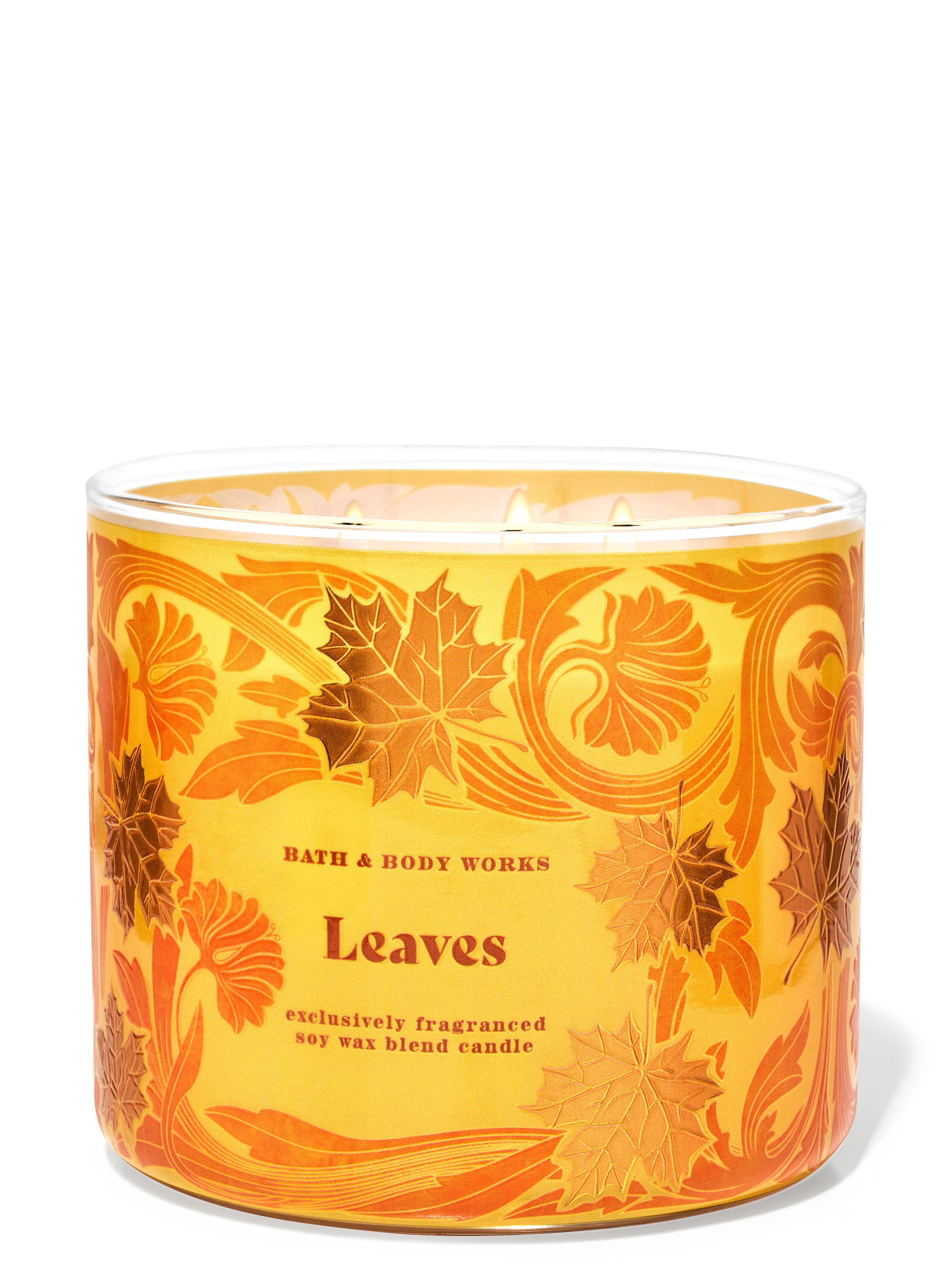 A yellow jar 3-wick candle