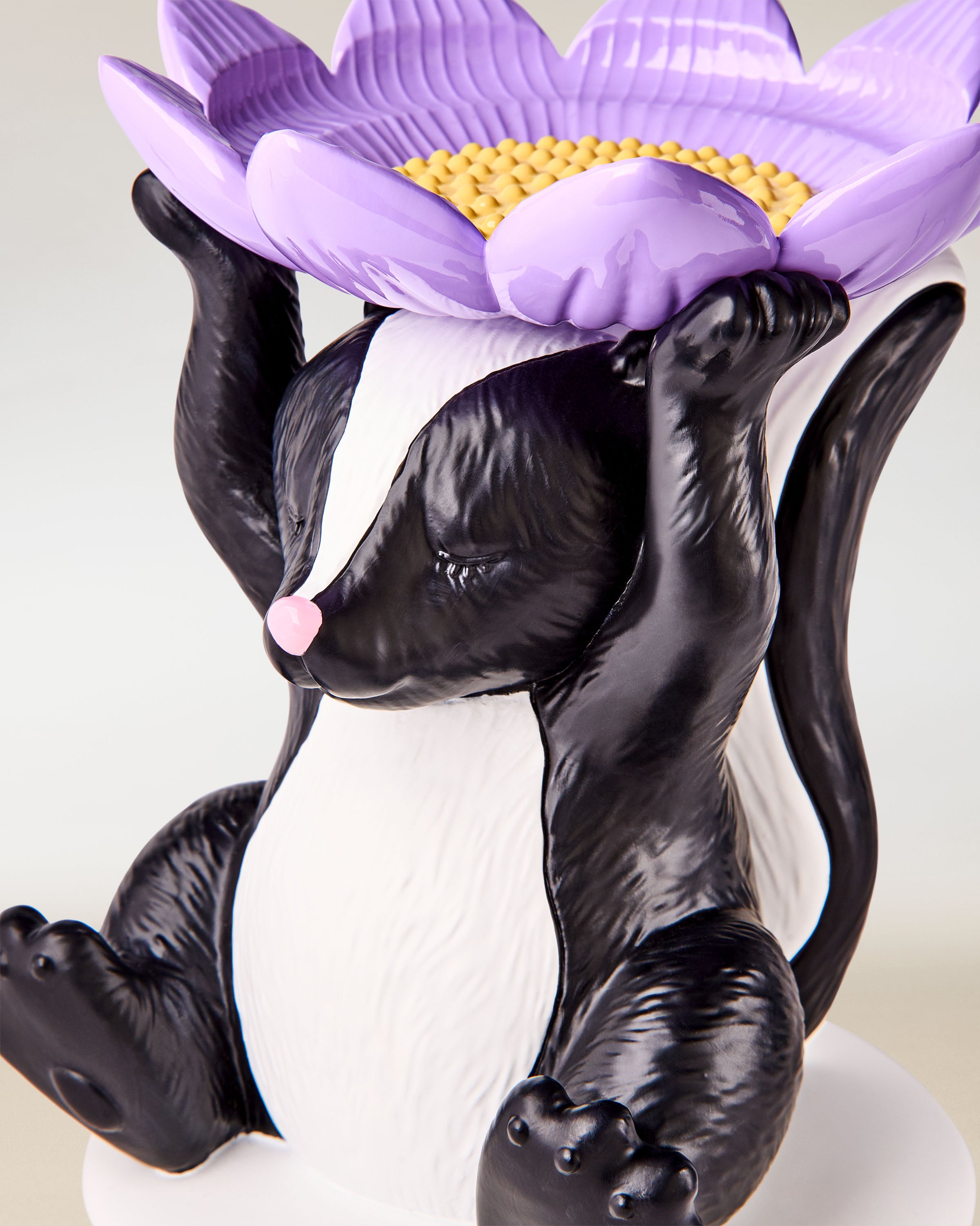 Flowery Skunk Pedestal 3-Wick Candle Holder